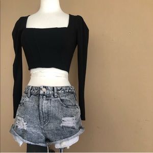 High waisted cut off distressed denim shorts.